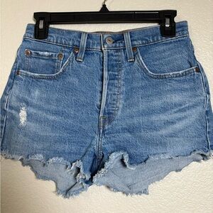Levi's Woman’s 501 Covered Button Fly Jean Shorts with Distressed Frayed Hem. 26